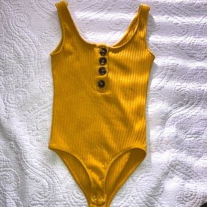 Yellow bodysuit